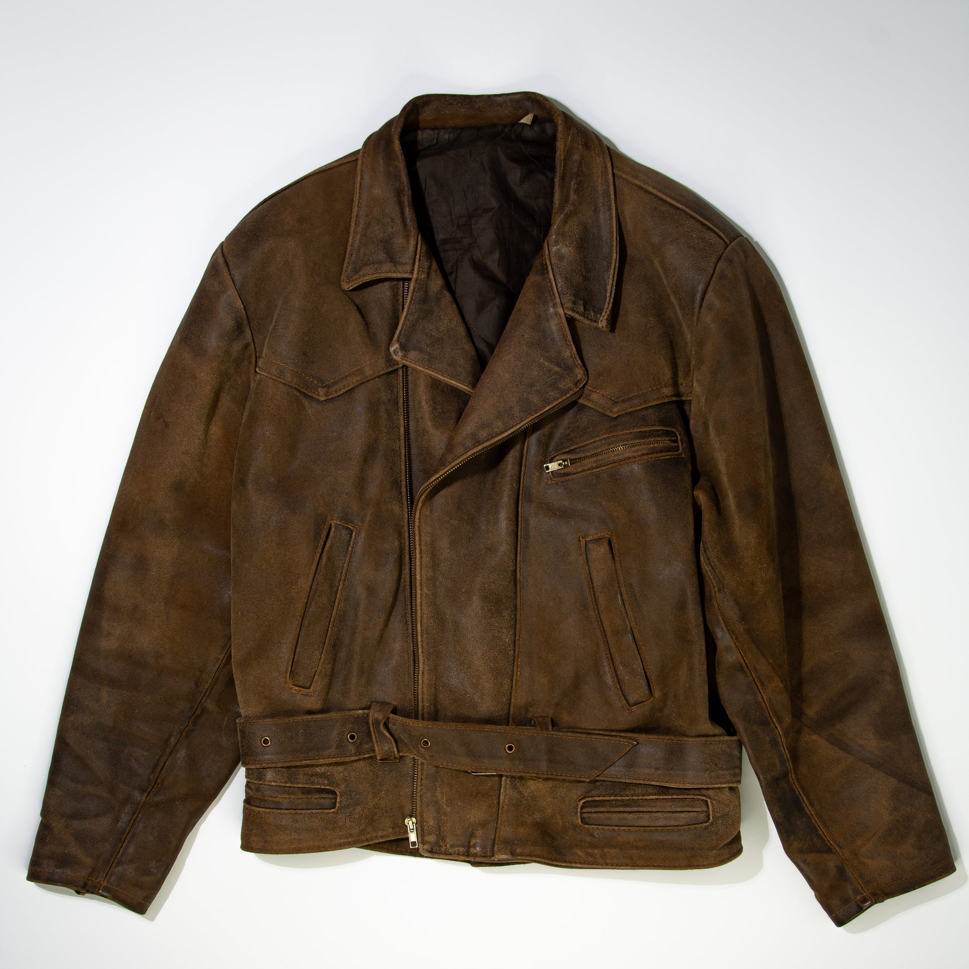 brown woman’s bike leather jacket