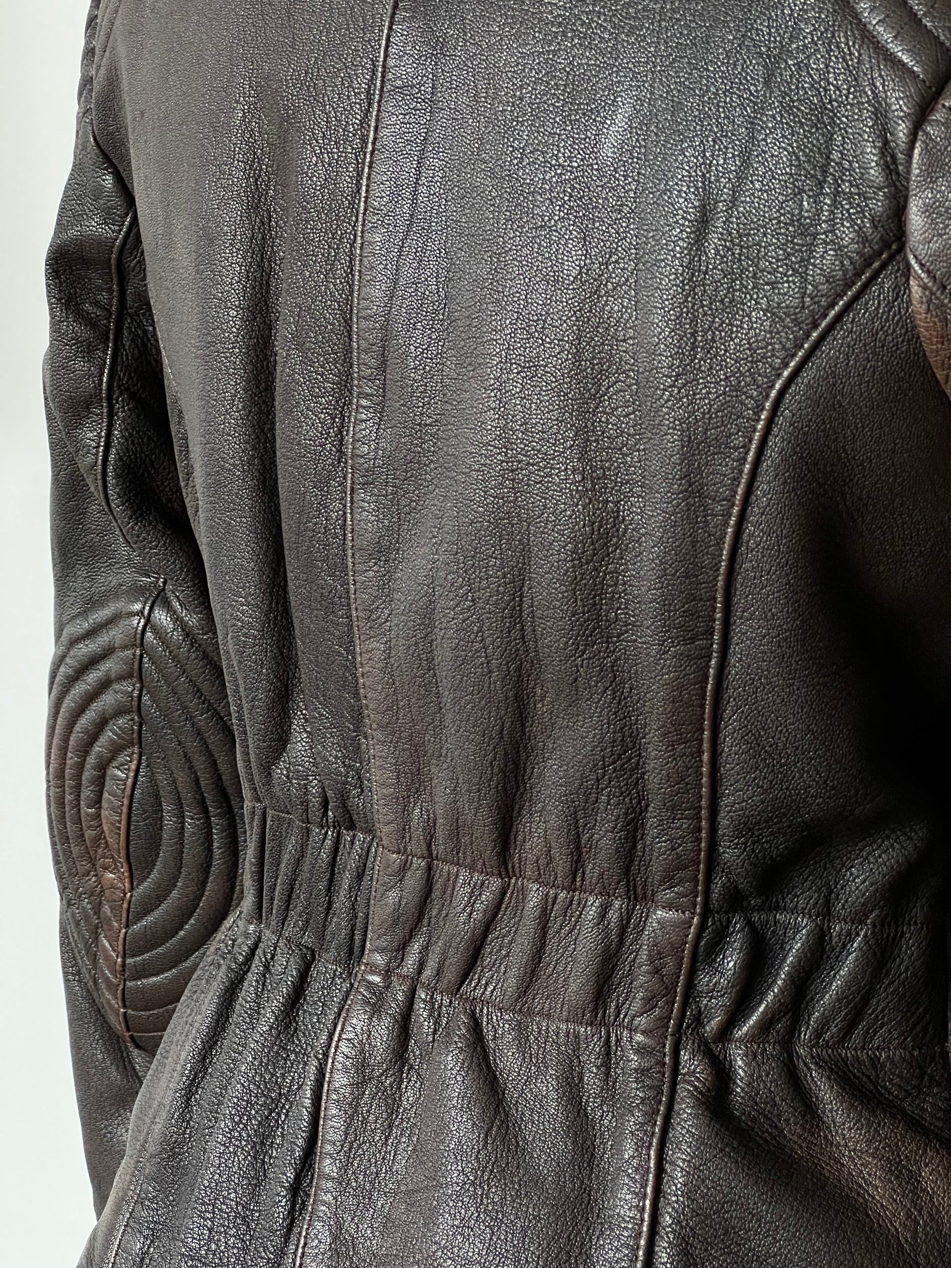 beautiful dark brown woman’s leather jacket waist