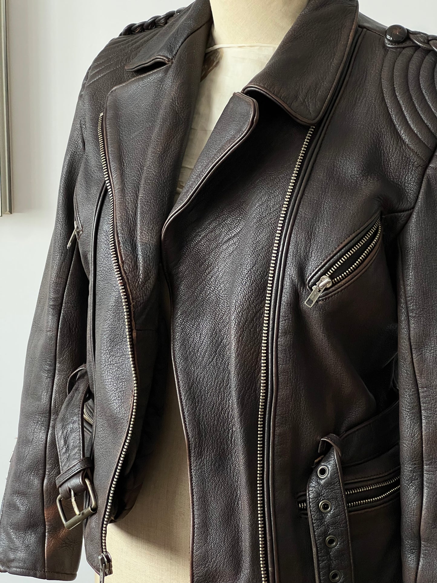 beautiful dark brown woman’s leather jacket on a mannequin