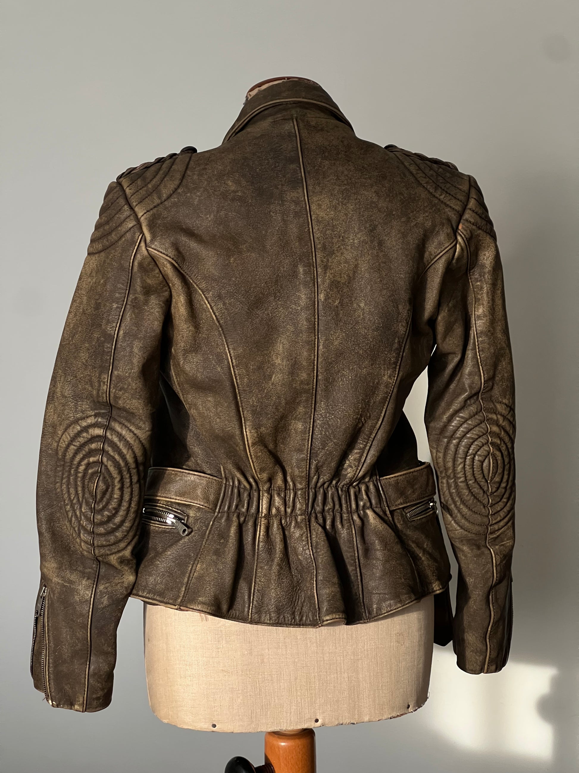 beautiful brown woman’s leather jacket waist back