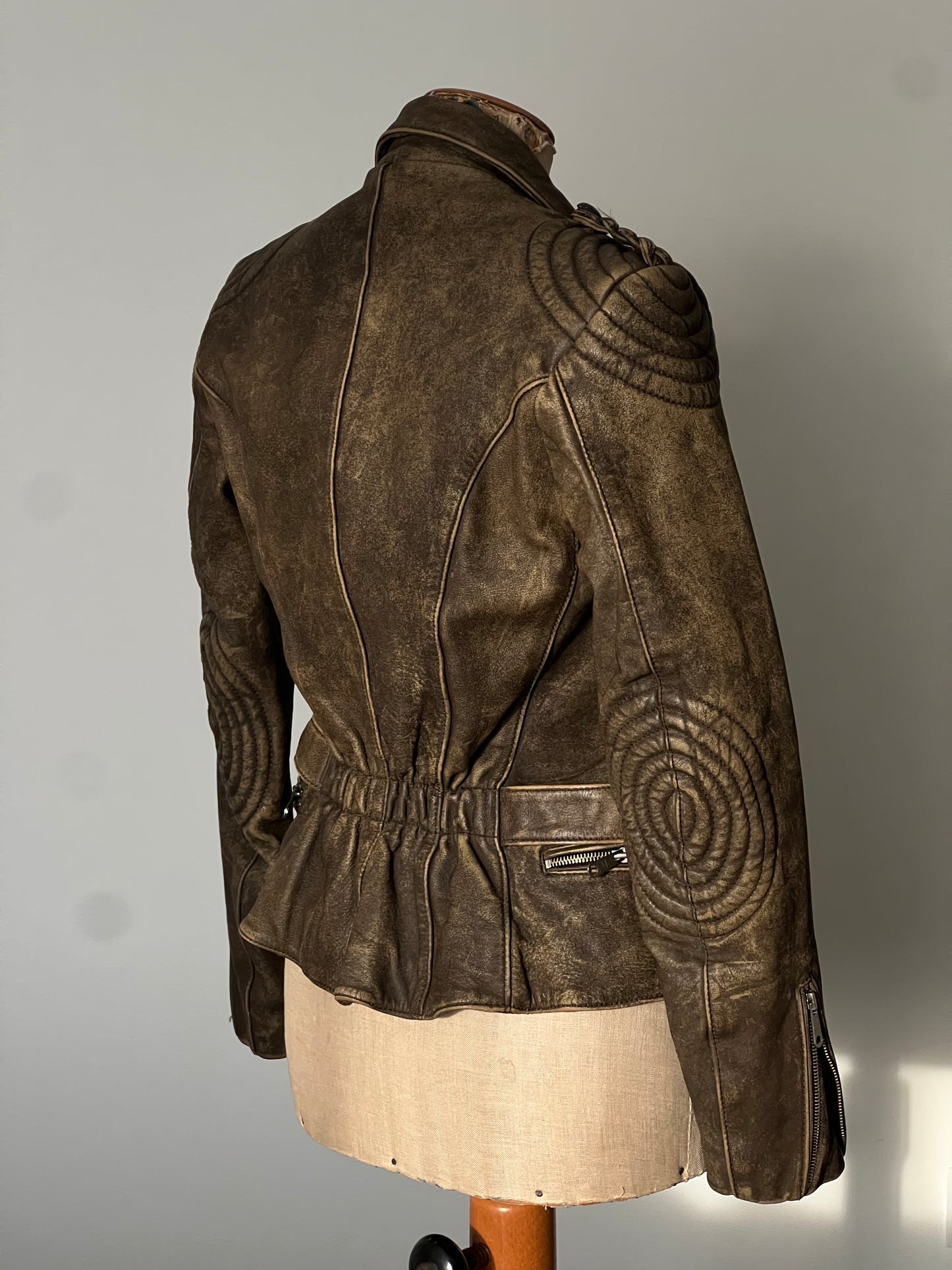 beautiful brown woman’s leather jacket back side