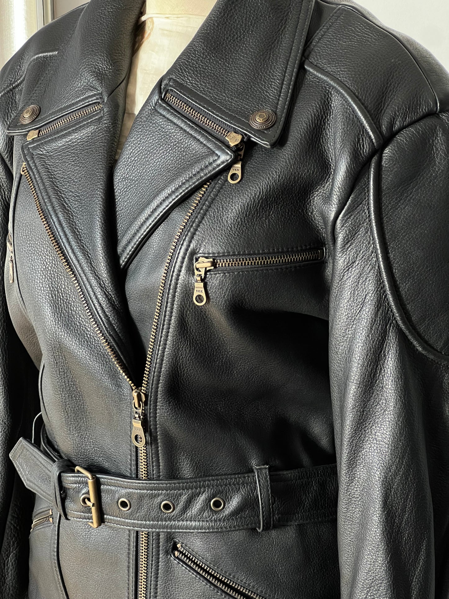 black woman’s leather jacket details