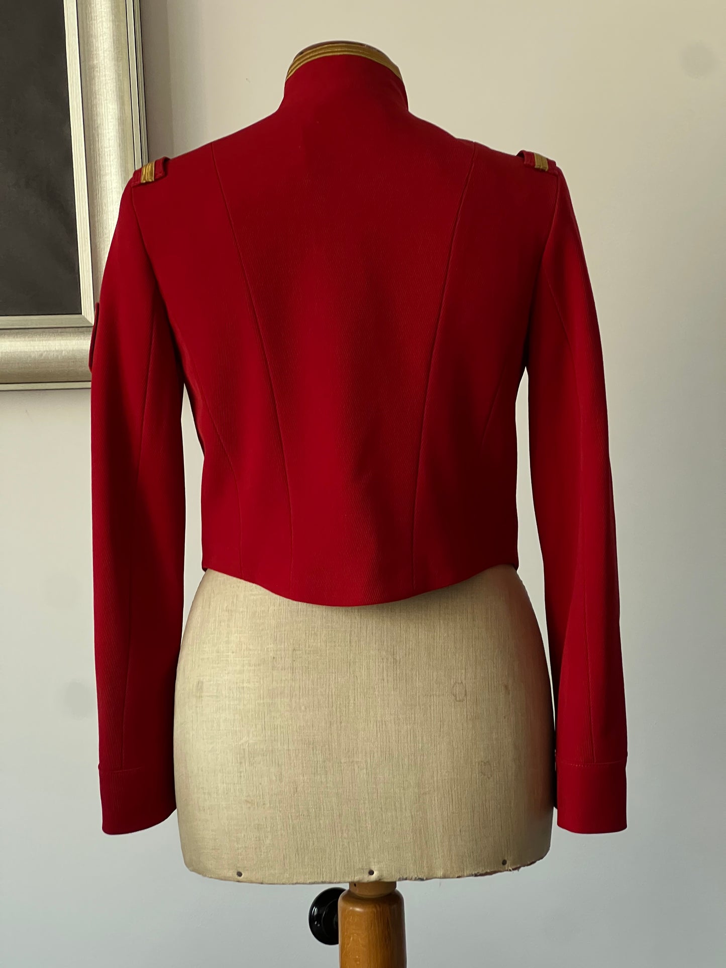 back of a red vintage women’s jacket