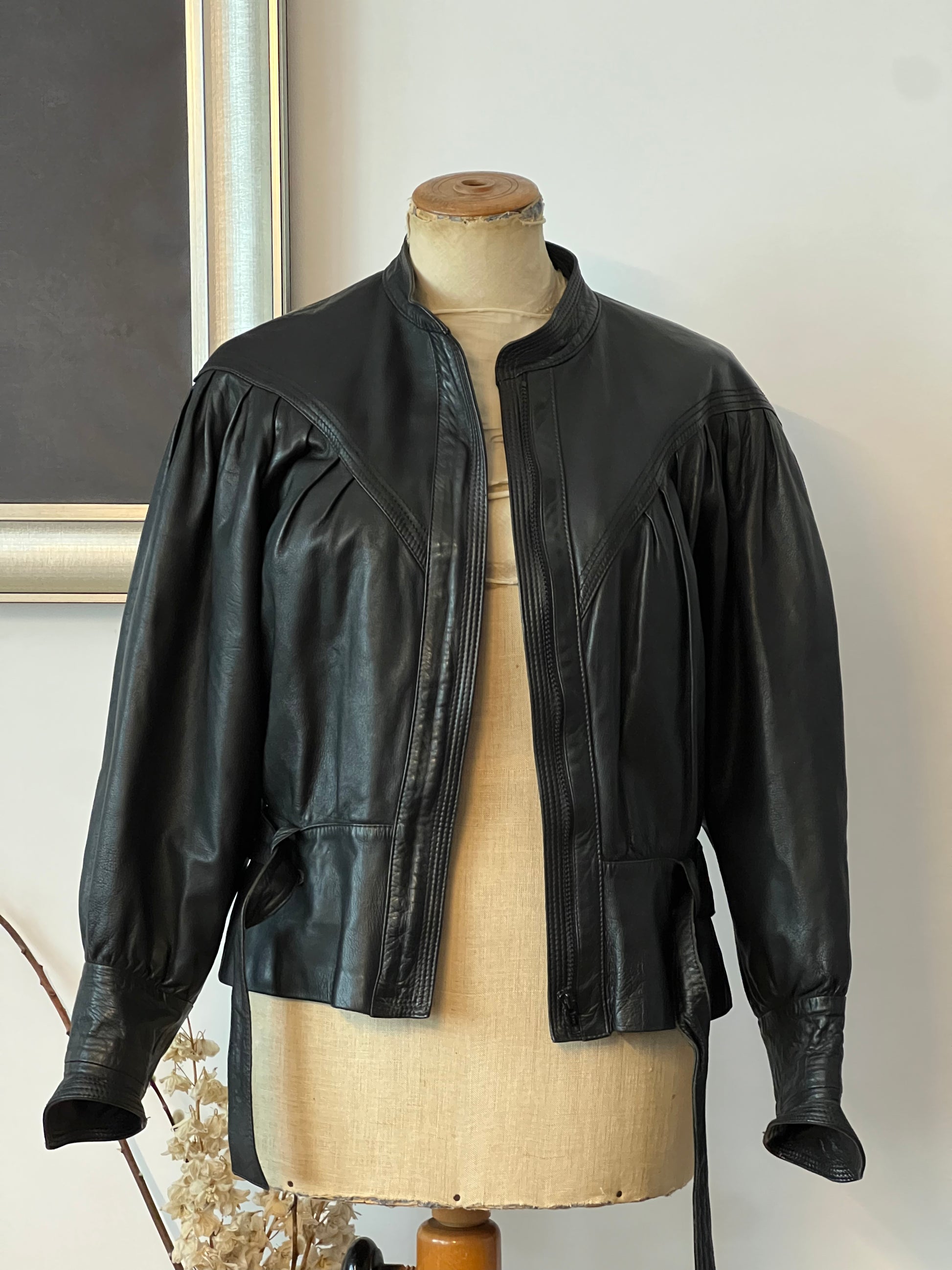 black woman’s leather jacket
