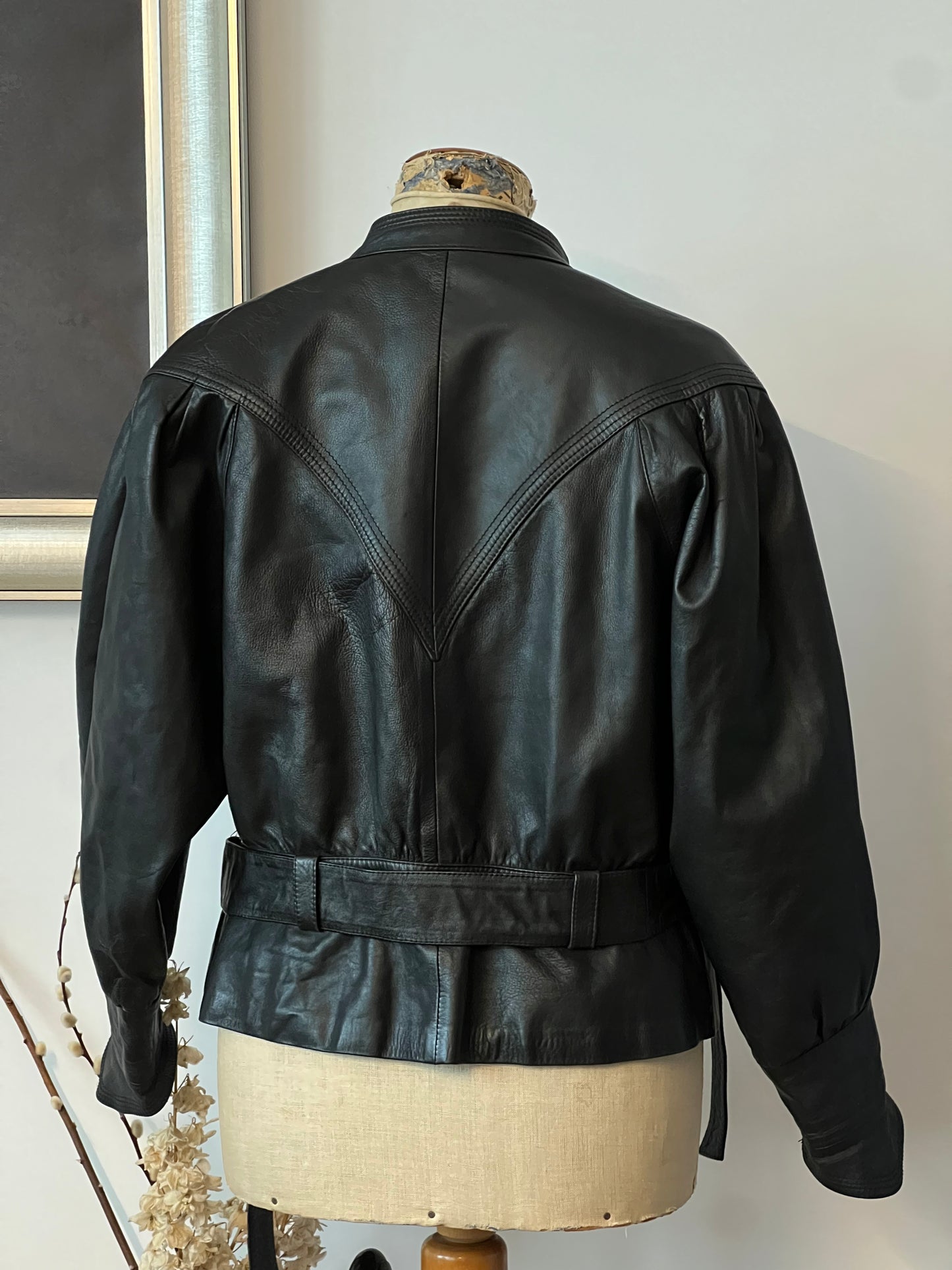 black woman’s leather jacket on a mannequin